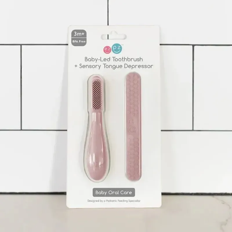 ezpz Oral & Nasal Care*- Baby-Led™ Toothbrush + Sensory Tongue Depressor Dual Pack, Blush