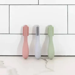 ezpz Oral & Nasal Care*- Baby-Led™ Toothbrush + Sensory Tongue Depressor Dual Pack, Blush