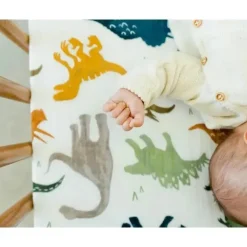 Little Unicorn Crib & Bed Sheets*Cotton Muslin Crib Sheet - Dino Friends