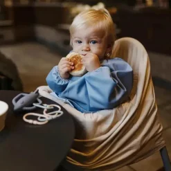 Mushie Baby Coats, Sweaters & Jackets*- Long Sleeve Baby Bib, Waterproof Fabric, Adjustable Fit for Ages 6-24 Months, Tradewinds