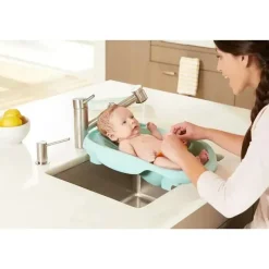 Tomy Bath Tubs & Seats*The First Years 4-in-1 Warming Comfort Tub - Teal/White