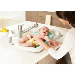 Tomy Bath Tubs & Seats*The First Years 4-in-1 Warming Comfort Tub - Teal/White