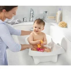 Tomy Bath Tubs & Seats*The First Years 4-in-1 Warming Comfort Tub - Teal/White
